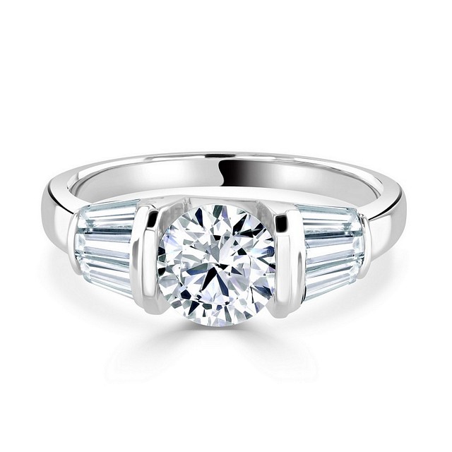 Special Round Solitaire set withTapper Baguette shoulders